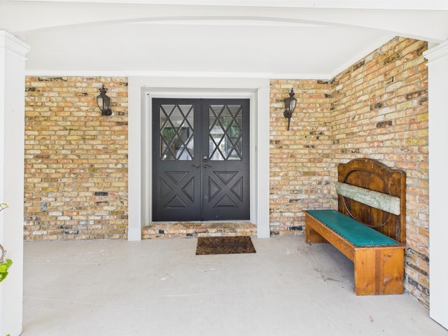 2045 SW 18th Ln, Okeechobee, FL 34974 - property entrance featuring french doors and brick siding