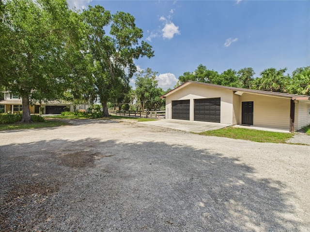 2045 SW 18th Ln, Okeechobee, FL 34974 - garage with driveway