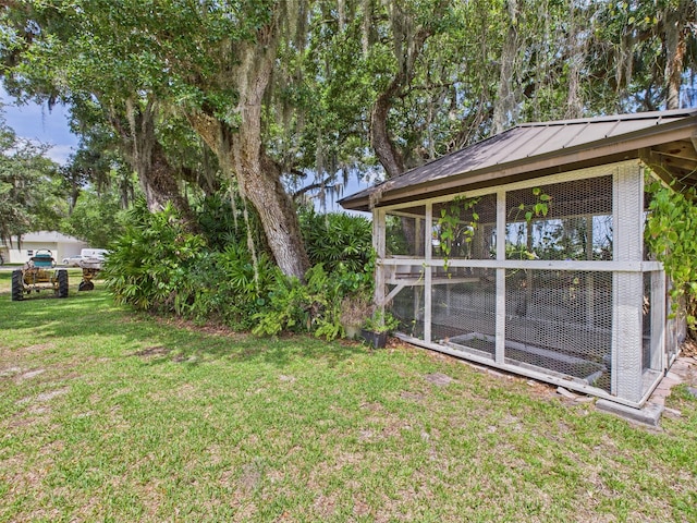 2045 SW 18th Ln, Okeechobee, FL 34974 - view of green lawn featuring exterior structure and an outbuilding