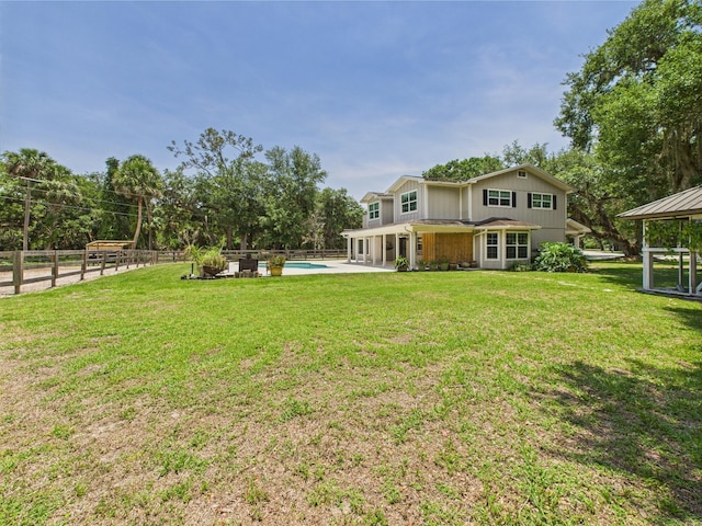 2045 SW 18th Ln, Okeechobee, FL 34974 - view of yard with a patio