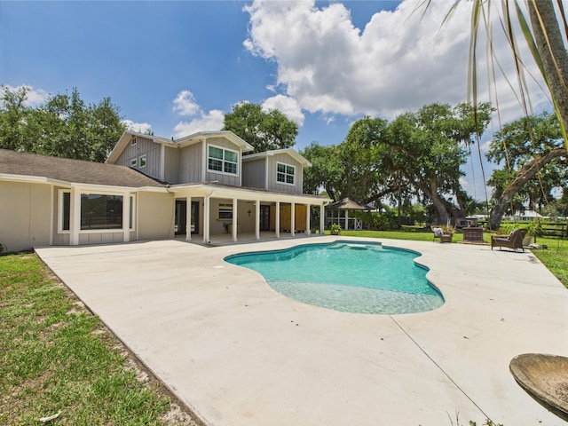 2045 SW 18th Ln, Okeechobee, FL 34974 - outdoor pool with a patio area