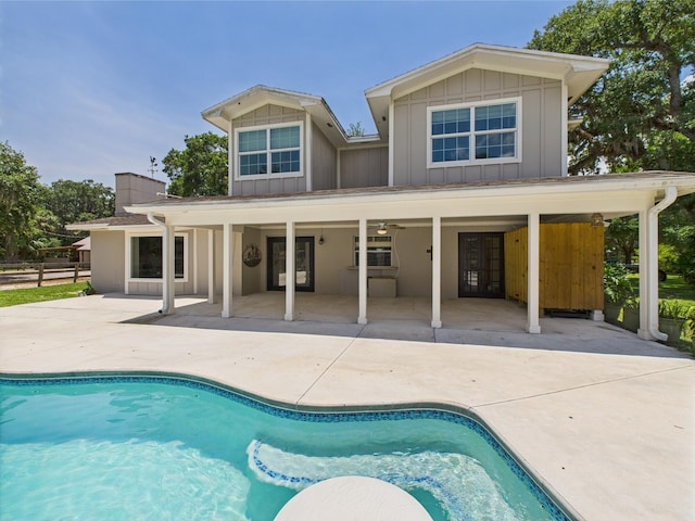 2045 SW 18th Ln, Okeechobee, FL 34974 - outdoor pool with french doors and a patio
