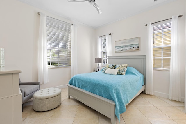 10171 SW Dolce Rd, Port Saint Lucie, FL 34986 - tiled bedroom with ornamental molding, multiple windows, baseboards, and ceiling fan