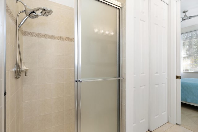 10171 SW Dolce Rd, Port Saint Lucie, FL 34986 - ensuite bathroom with a stall shower and tile patterned floors