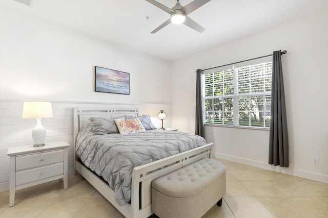 10171 SW Dolce Rd, Port Saint Lucie, FL 34986 - bedroom featuring light tile patterned floors, baseboards, and a ceiling fan