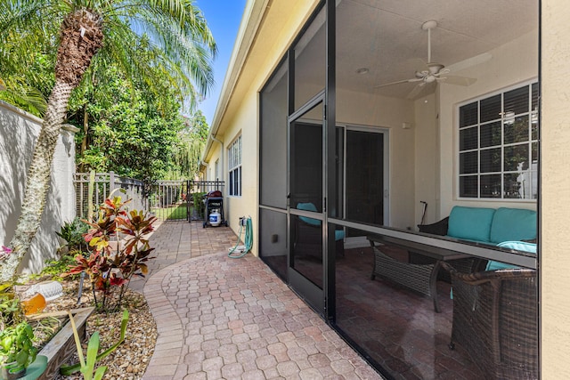 10171 SW Dolce Rd, Port Saint Lucie, FL 34986 - fenced backyard with a ceiling fan and a patio area