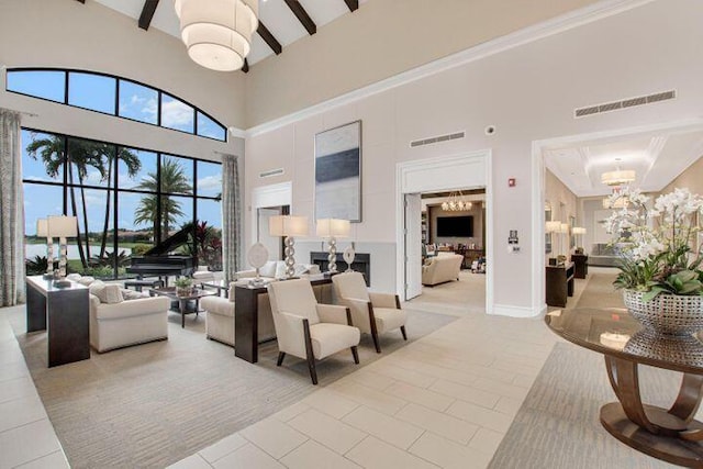 10171 SW Dolce Rd, Port Saint Lucie, FL 34986 - common area with a high ceiling and beamed ceiling