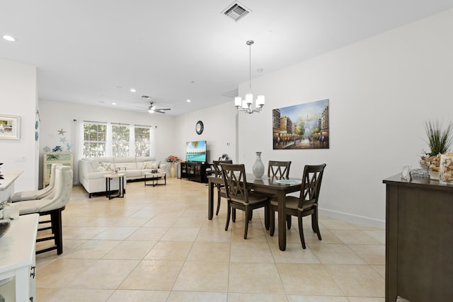 10171 SW Dolce Rd, Port Saint Lucie, FL 34986 - dining space featuring light tile patterned floors, recessed lighting, a ceiling fan, and a chandelier