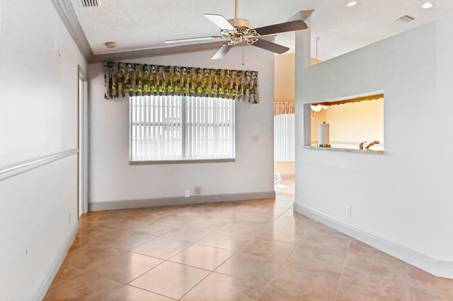 8586 Brian Blvd, Boynton Beach, FL 33472 - tiled empty room featuring lofted ceiling, ceiling fan, baseboards, and a textured ceiling