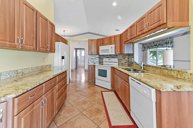 8586 Brian Blvd, Boynton Beach, FL 33472 - kitchen featuring white appliances, a sink, light tile patterned floors, decorative backsplash, and lofted ceiling