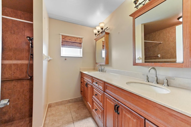 8586 Brian Blvd, Boynton Beach, FL 33472 - full bath with double vanity, tiled shower, tile patterned floors, and baseboards