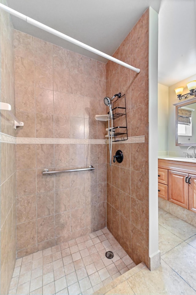 8586 Brian Blvd, Boynton Beach, FL 33472 - bathroom featuring a tile shower, vanity, and tile patterned flooring