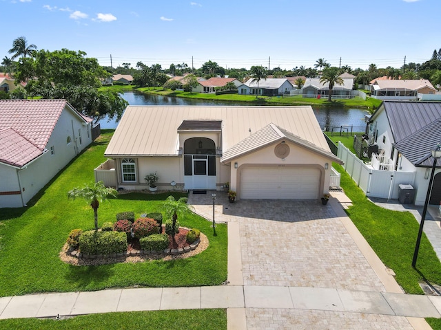 8586 Brian Blvd, Boynton Beach, FL 33472 - view of front of home featuring a residential view, a garage, driveway, a gate, and stucco siding