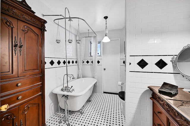 1328 SE 3rd Ave, Deerfield Beach, FL 33441 - full bath with tile walls, a freestanding tub, vanity, and a shower