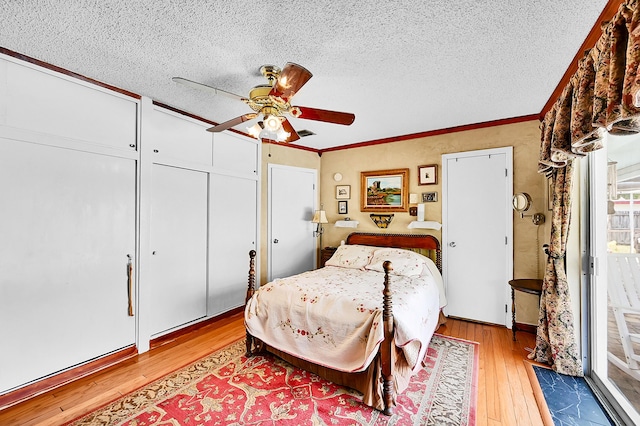1328 SE 3rd Ave, Deerfield Beach, FL 33441 - bedroom with wood-type flooring, a textured ceiling, crown molding, and ceiling fan