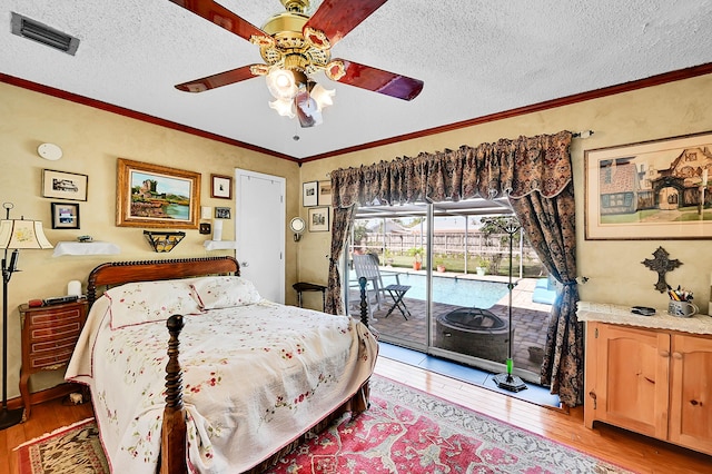 1328 SE 3rd Ave, Deerfield Beach, FL 33441 - bedroom with access to outside, light wood-style floors, a textured ceiling, crown molding, and a ceiling fan