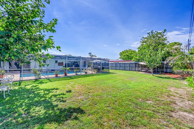 1328 SE 3rd Ave, Deerfield Beach, FL 33441 - view of yard with a lanai
