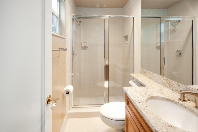 6051 NW 24th Ter, Boca Raton, FL 33496 - bathroom with toilet, vanity, a stall shower, and tile patterned floors