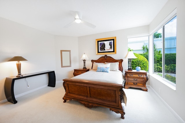 6051 NW 24th Ter, Boca Raton, FL 33496 - carpeted bedroom featuring multiple windows, baseboards, and a ceiling fan