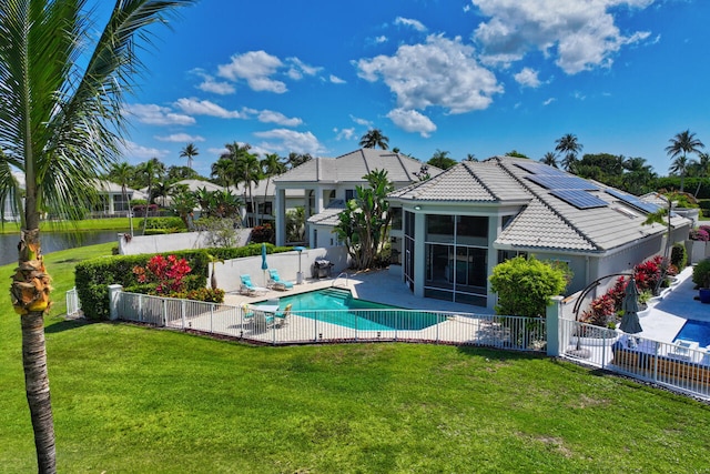 6051 NW 24th Ter, Boca Raton, FL 33496 - view of pool featuring a sunroom, a patio area, and a water view