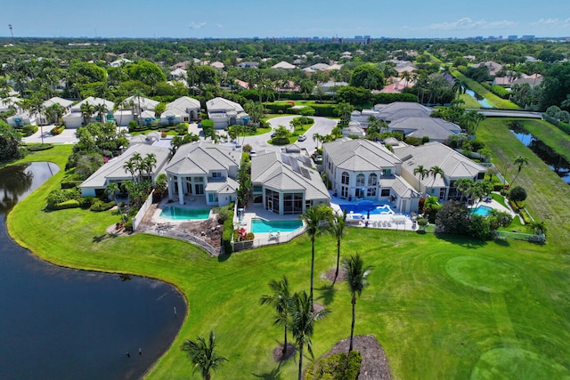 6051 NW 24th Ter, Boca Raton, FL 33496 - aerial perspective of suburban area featuring a pool area and a nearby body of water