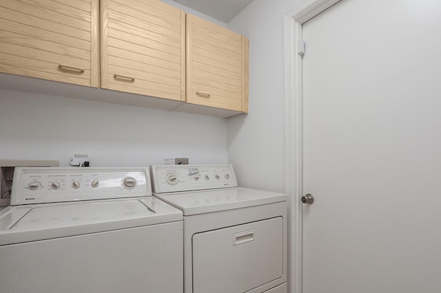135 Eagleton Ct, Palm Beach Gardens, FL 33418 - washroom featuring cabinet space and washer and dryer