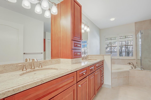 135 Eagleton Ct, Palm Beach Gardens, FL 33418 - bathroom featuring tile patterned floors, a bath, and double vanity