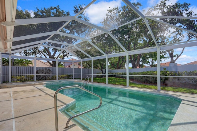 135 Eagleton Ct, Palm Beach Gardens, FL 33418 - view of swimming pool with a fenced backyard, a patio, and a lanai