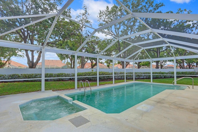 135 Eagleton Ct, Palm Beach Gardens, FL 33418 - view of pool featuring a pool with connected hot tub, a patio, and a lanai