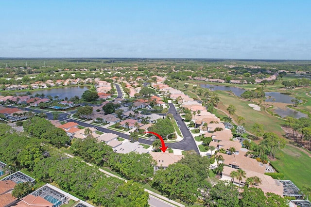 135 Eagleton Ct, Palm Beach Gardens, FL 33418 - aerial overview of property's location featuring a large body of water, nearby suburban area, and a golf course
