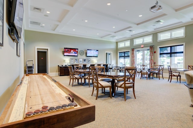 6020 Wild Olive Way, Vero Beach, FL 32966 - dining space featuring coffered ceiling, light carpet, healthy amount of natural light, baseboards, and beam ceiling