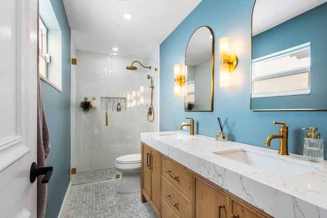 220 Fordham Dr, Lake Worth Beach, FL 33460 - bathroom with a tile shower, toilet, double vanity, and recessed lighting
