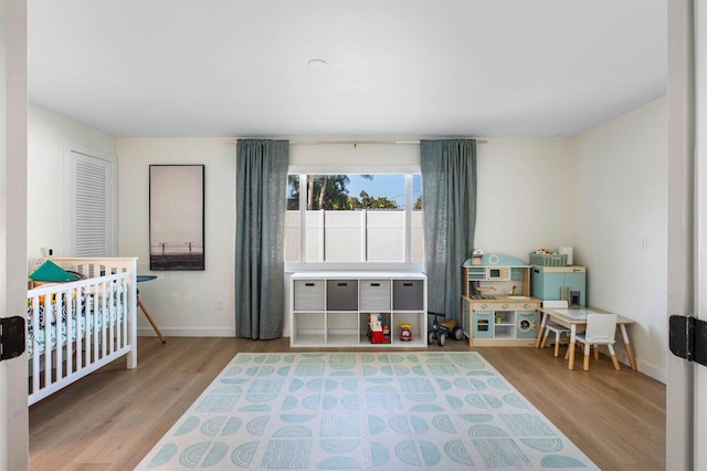 220 Fordham Dr, Lake Worth Beach, FL 33460 - bedroom featuring wood finished floors and baseboards