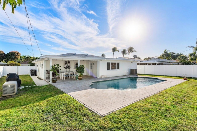220 Fordham Dr, Lake Worth Beach, FL 33460 - back of property with a patio area, stucco siding, and central AC unit