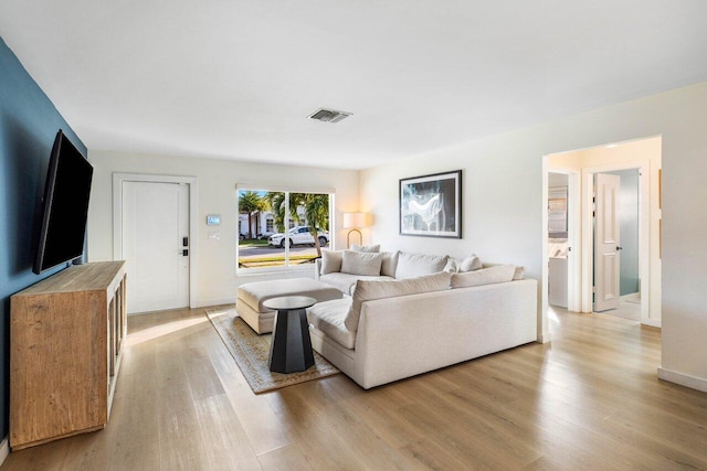 220 Fordham Dr, Lake Worth Beach, FL 33460 - living room with light wood-style flooring and baseboards