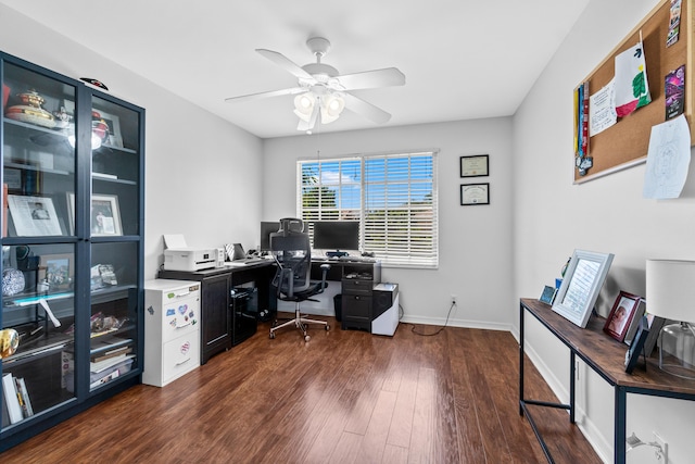 office featuring wood finished floors, ceiling fan, and baseboards