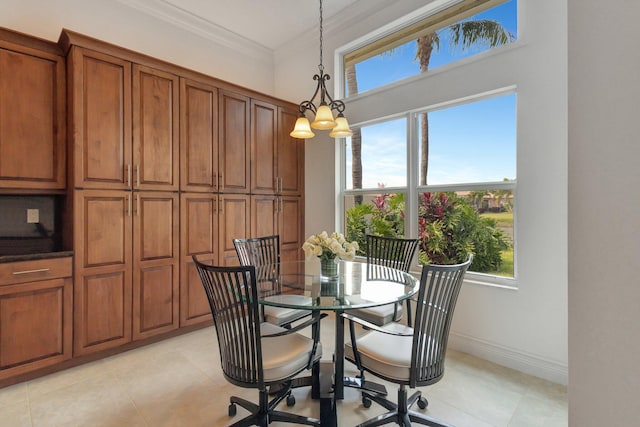 8273 Razorback Ct, Boynton Beach, FL 33473 - dining room with light tile patterned floors, ornamental molding, baseboards, and a chandelier