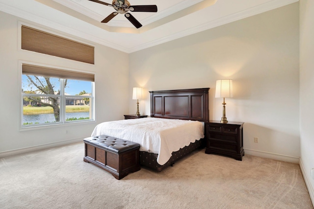 8273 Razorback Ct, Boynton Beach, FL 33473 - bedroom featuring light colored carpet, ornamental molding, a tray ceiling, baseboards, and ceiling fan