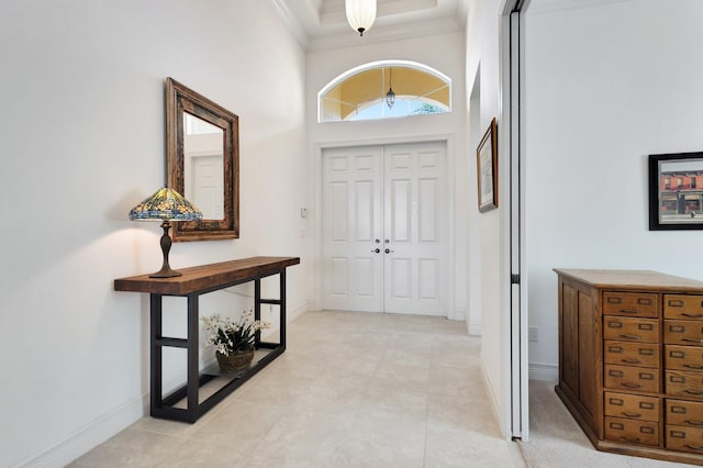 8273 Razorback Ct, Boynton Beach, FL 33473 - entrance foyer featuring ornamental molding, baseboards, and a towering ceiling