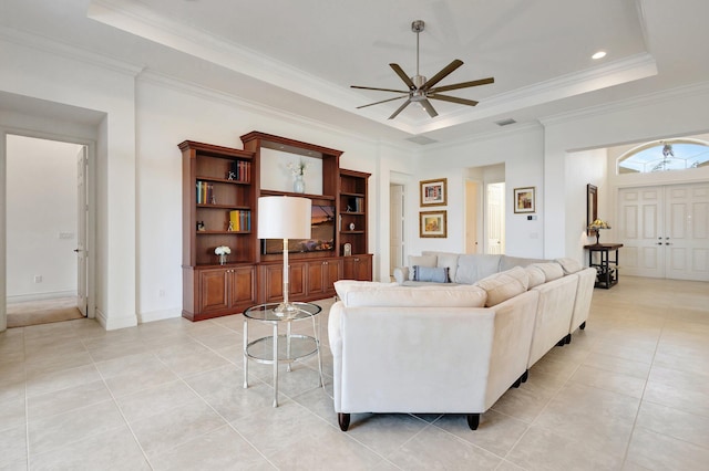 8273 Razorback Ct, Boynton Beach, FL 33473 - living area featuring a tray ceiling, ornamental molding, ceiling fan, light tile patterned floors, and recessed lighting
