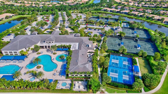8273 Razorback Ct, Boynton Beach, FL 33473 - aerial perspective of suburban area featuring a pool area and a nearby body of water