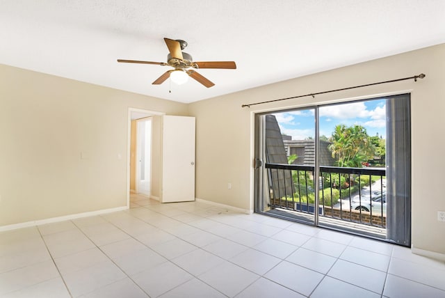 707 7th Ter, Palm Beach Gardens, FL 33418 - empty room featuring ceiling fan, baseboards, and light tile patterned floors