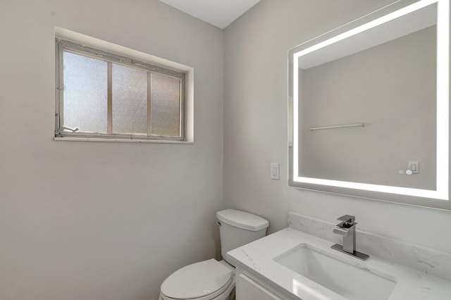 half bath with toilet and vanity