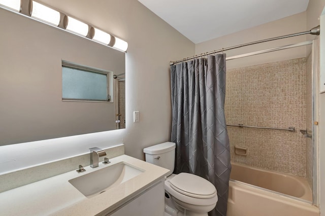 bathroom with shower / bath combo with shower curtain, toilet, and vanity