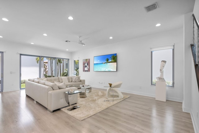 13444 Bernoulli Way, Palm Beach Gardens, FL 33418 - living area with recessed lighting, light wood-style flooring, baseboards, and ceiling fan