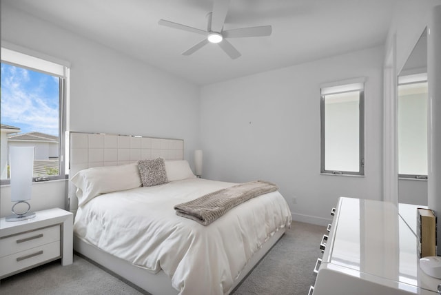 13444 Bernoulli Way, Palm Beach Gardens, FL 33418 - bedroom with light carpet, ceiling fan, and baseboards