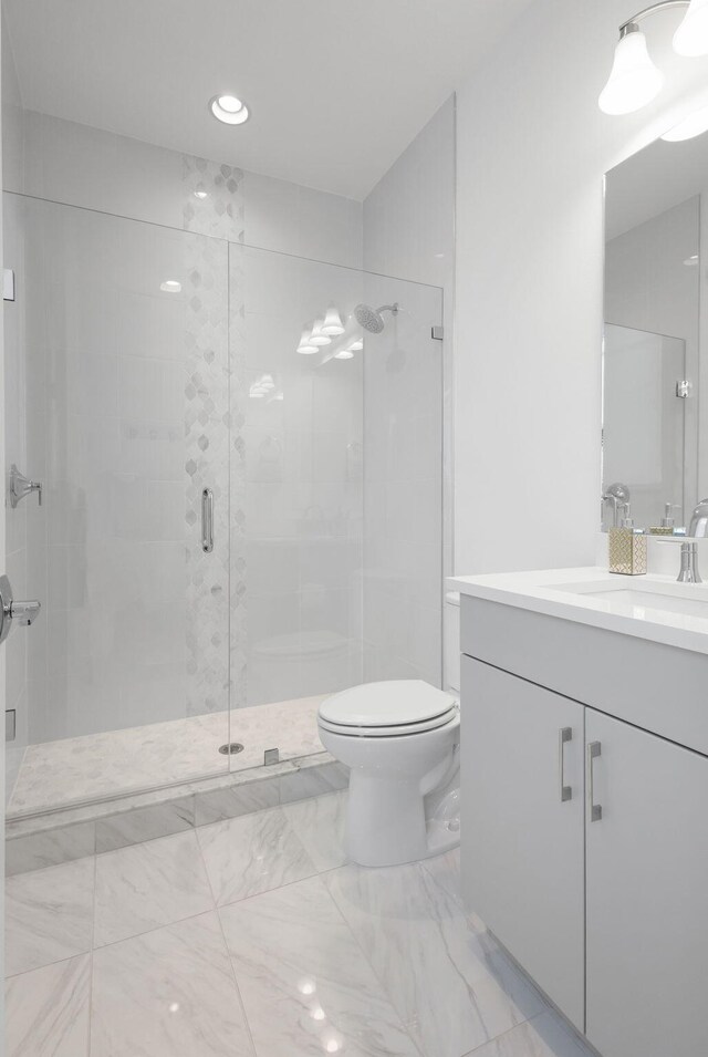 13444 Bernoulli Way, Palm Beach Gardens, FL 33418 - full bathroom featuring vanity, a stall shower, toilet, marble finish floors, and recessed lighting