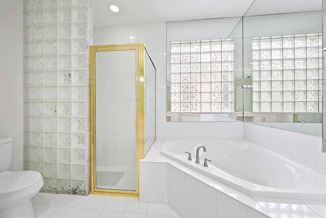 8405 Legend Club Dr, West Palm Beach, FL 33412 - bathroom with toilet, tile patterned floors, a garden tub, and a shower stall