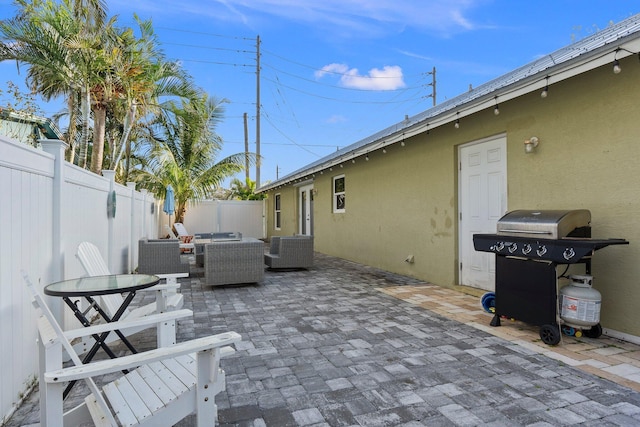 fenced backyard with central air condition unit, grilling area, a patio area, and outdoor dining area