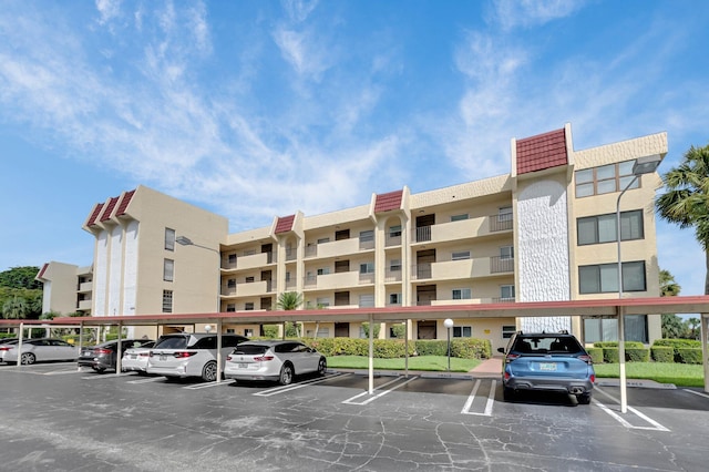 23247 Barwood Ln Unit 305, Boca Raton, FL 33428 - view of apartment building / complex with covered parking